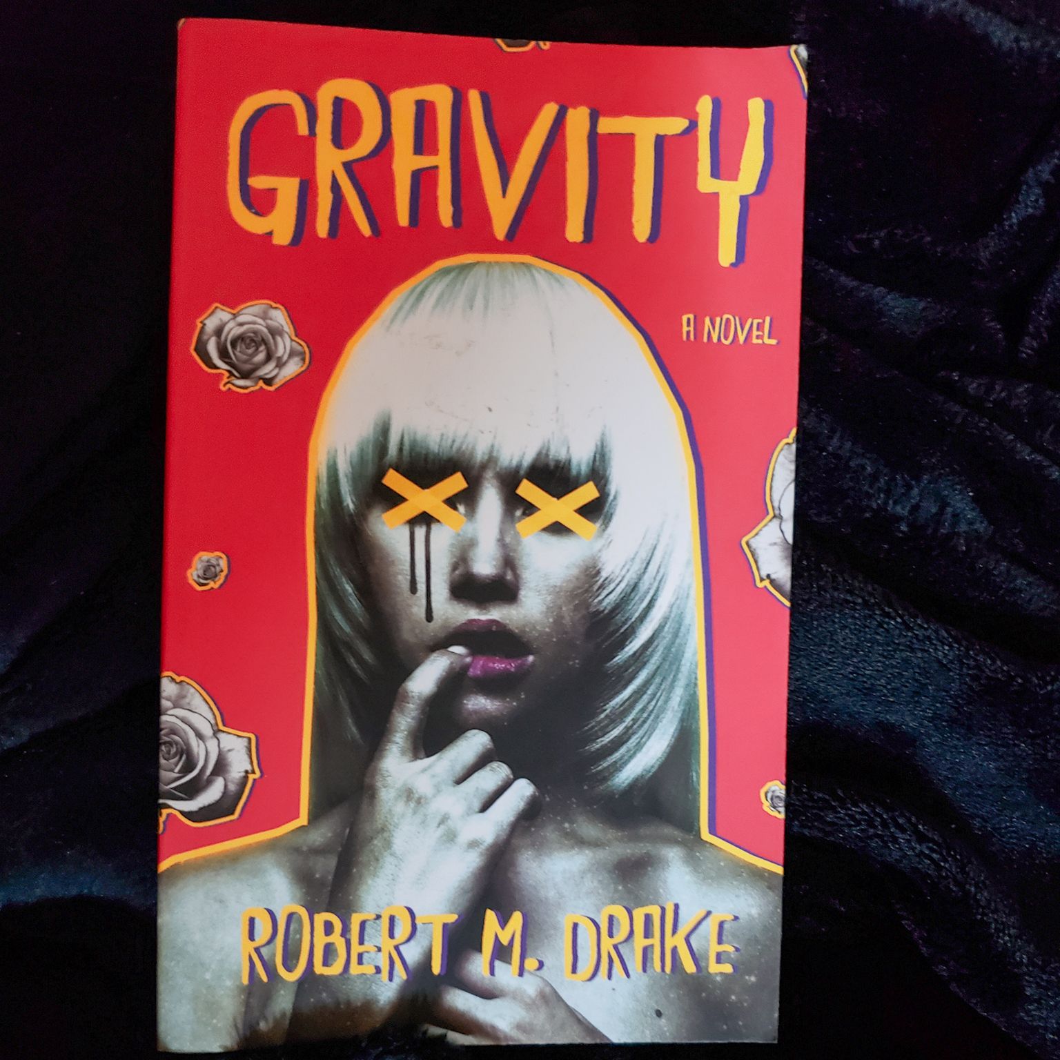 A photo of my friend's copy of Gravity by Robert M. Drake.