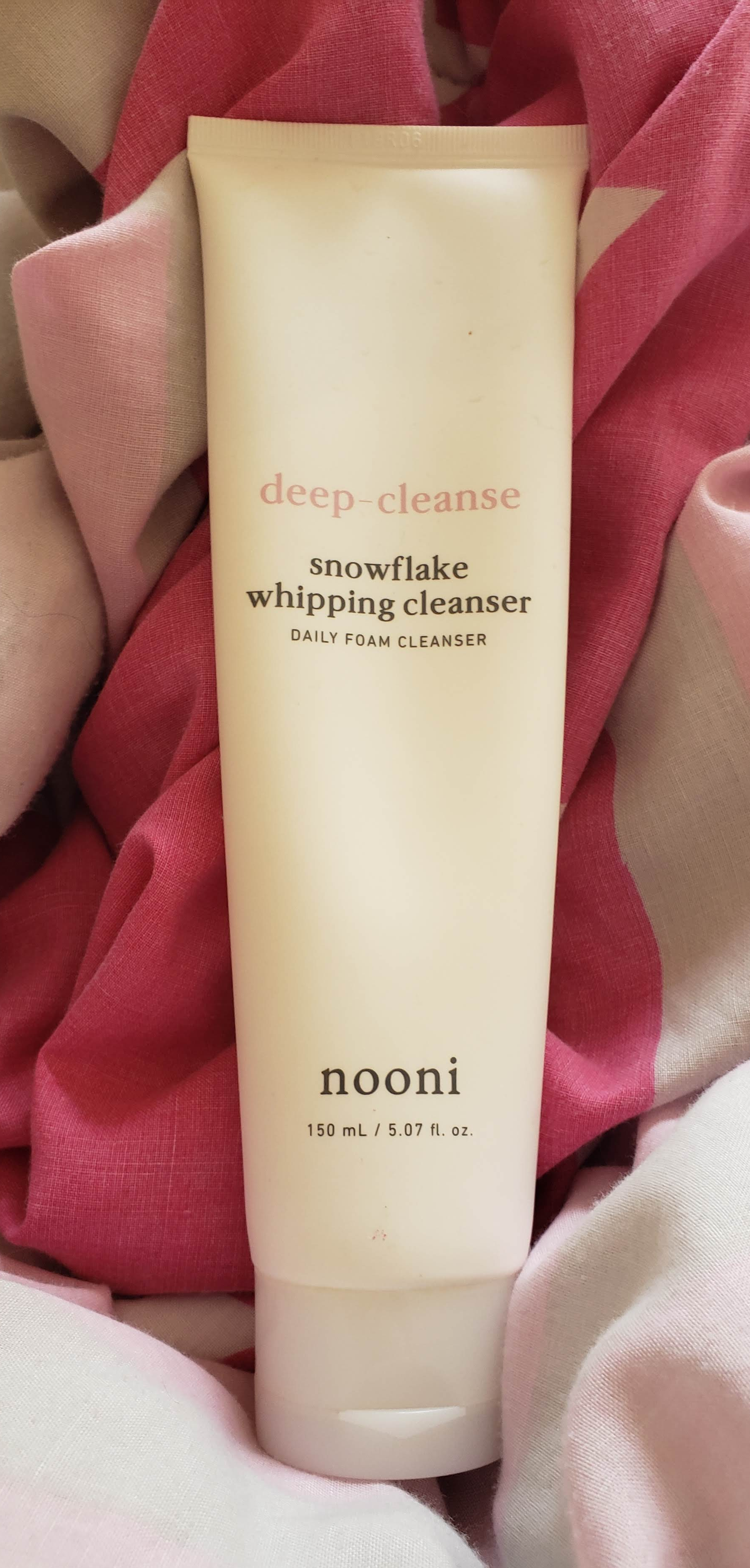 This is what the snowflake whipping cleanser looks like. It's very simple in white, with text to label exactly what the product is.