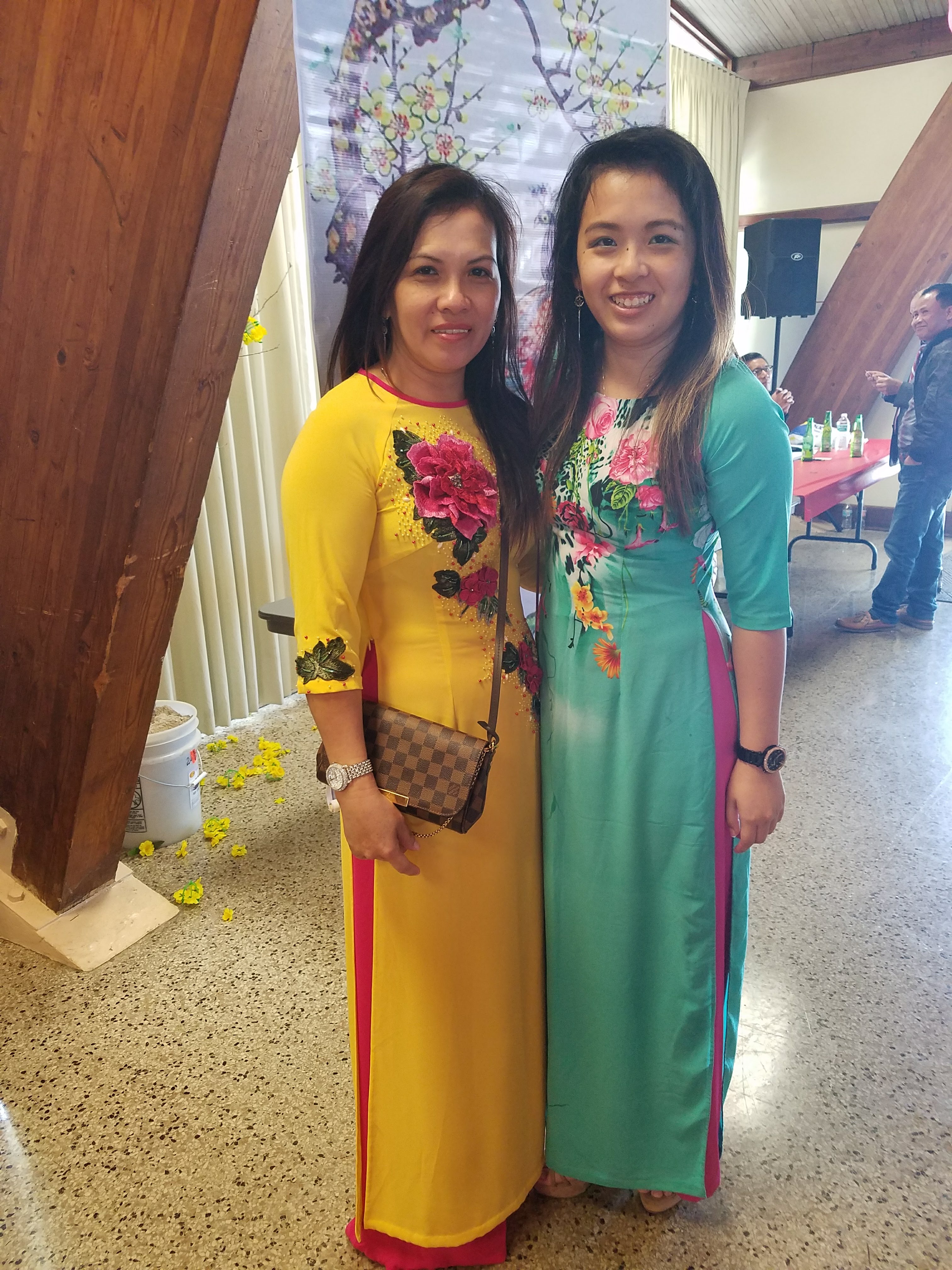 It's me and my mom in ao dais, the traditional Vietnamese dress for women.