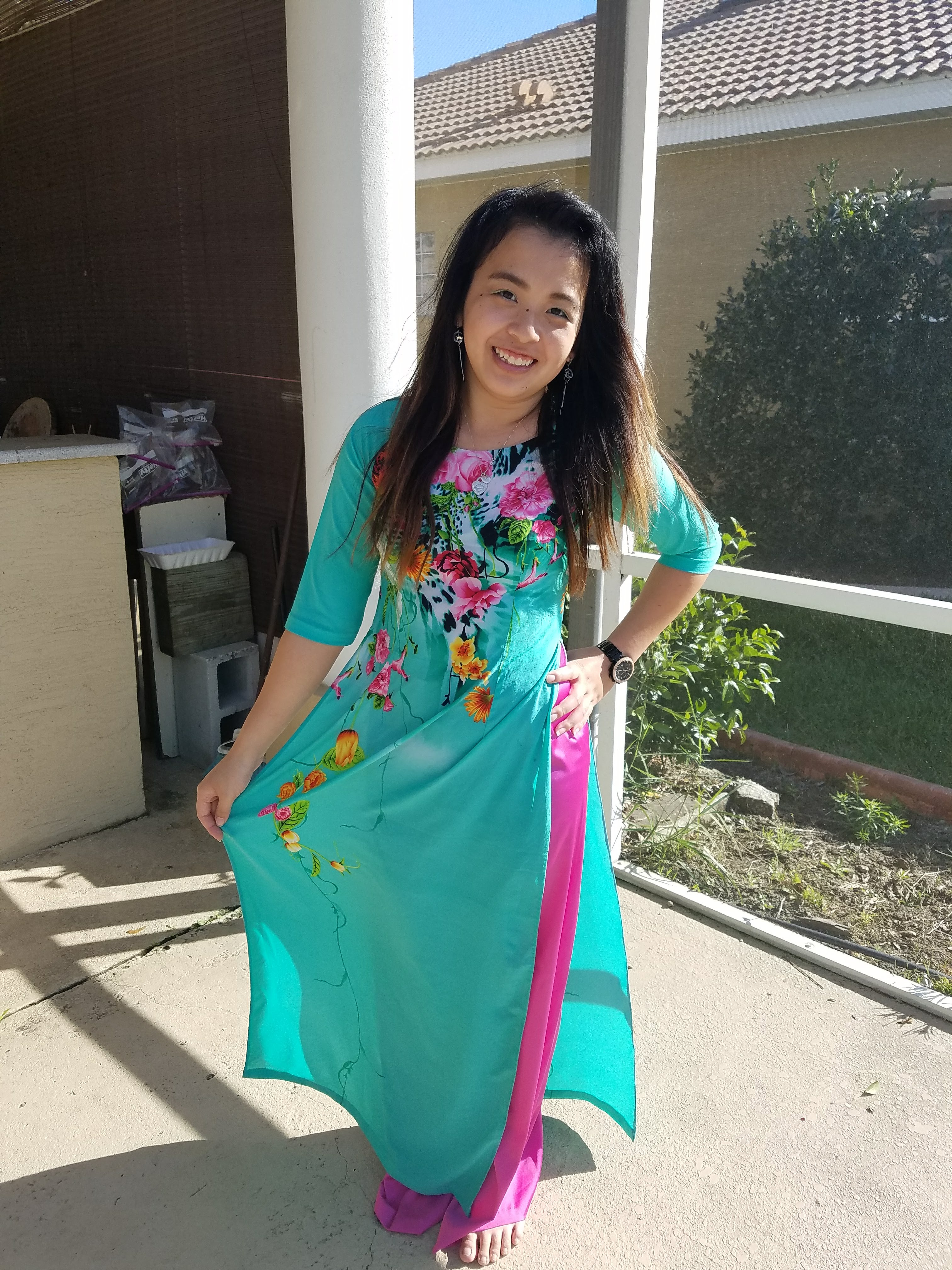 A Vietnamese dress is called an Ao Dai. Here is me in one from Lunar New Year. While it wasn't always easy, I've loved growing up with a Vietnamese background.