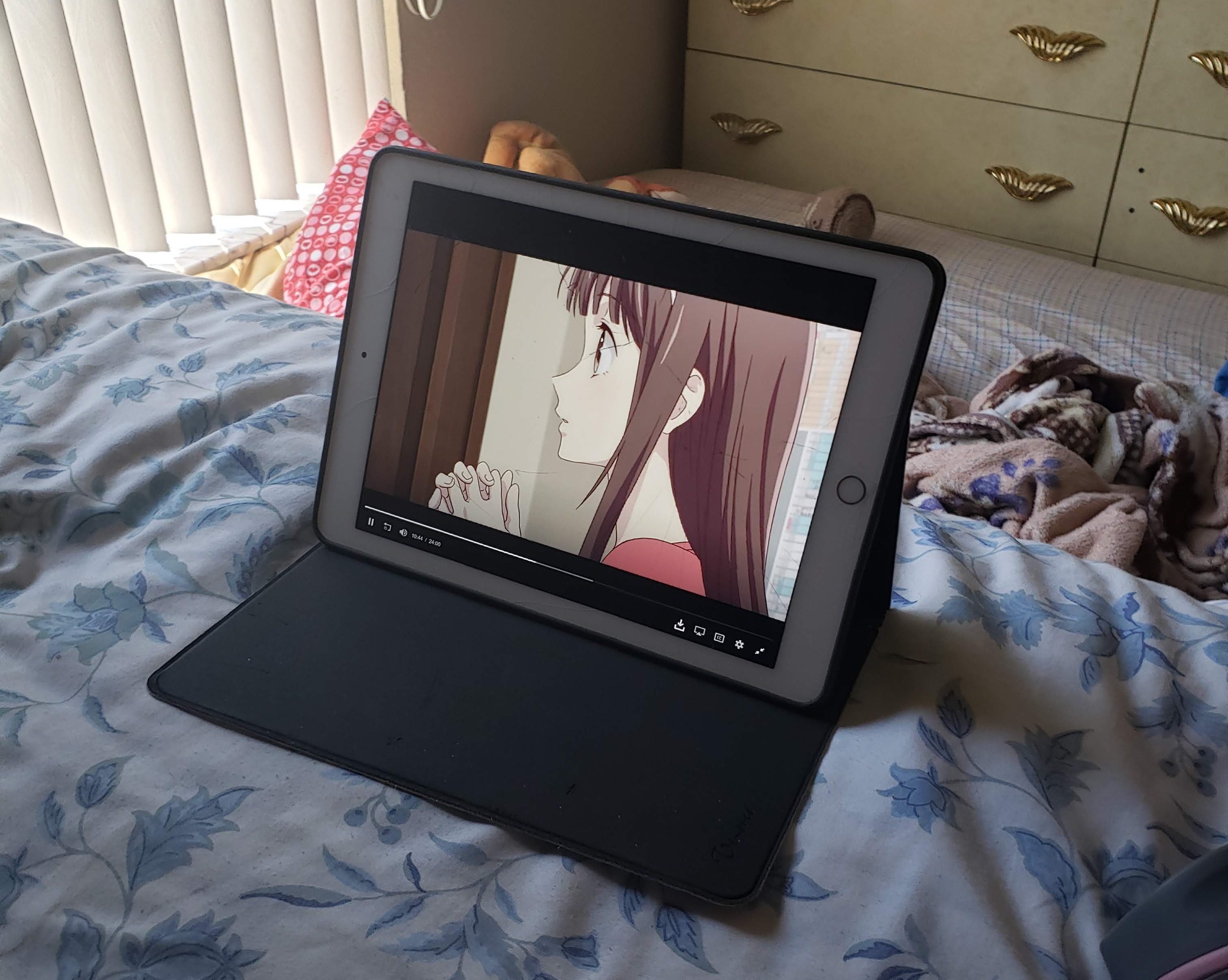 Here's a photo from a watch session my sisters and I are having as we crowd in my bed. Fruits Basket has launched a reboot, and we've been watching the episodes when they come out.