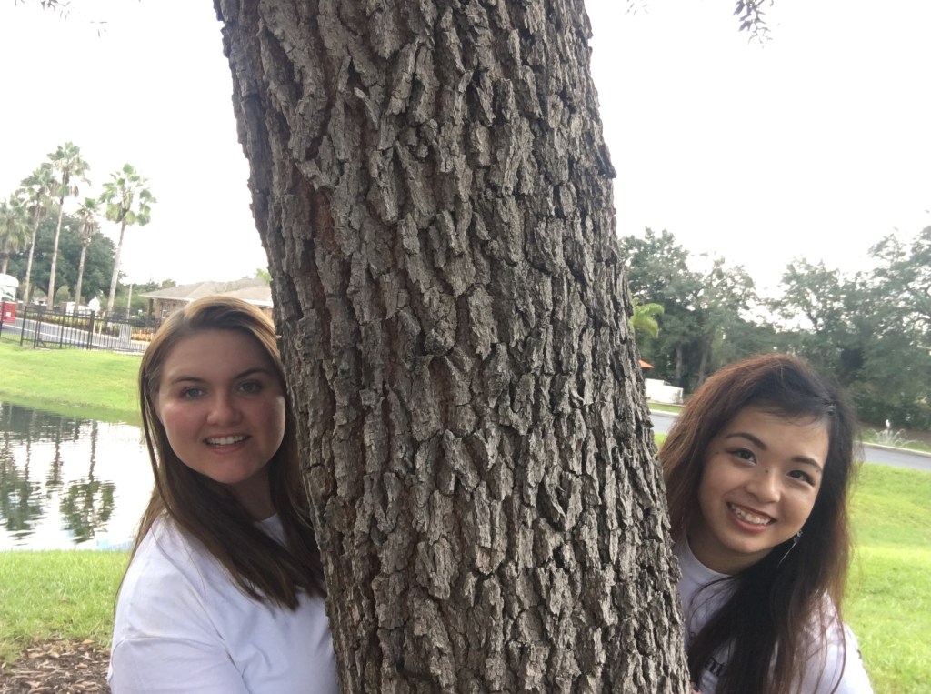 This is a photo of me and my big on the day of my big-little reveal. She taught me about the wonders of a tree as a prop in a photo. Looking back, I do look quite little.