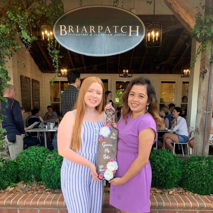 I wish I was as cute and classic as my paddle. Here is a photo of me with one of my littles in front of our favorite place to have brunch.