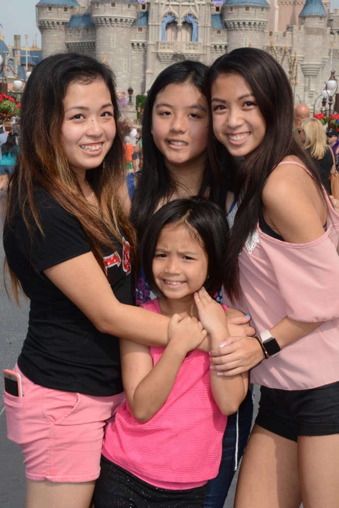 I would like to believe that they love me as much as I love them, but sometimes I'm not sure. Here's a very old photo of us at Disney.