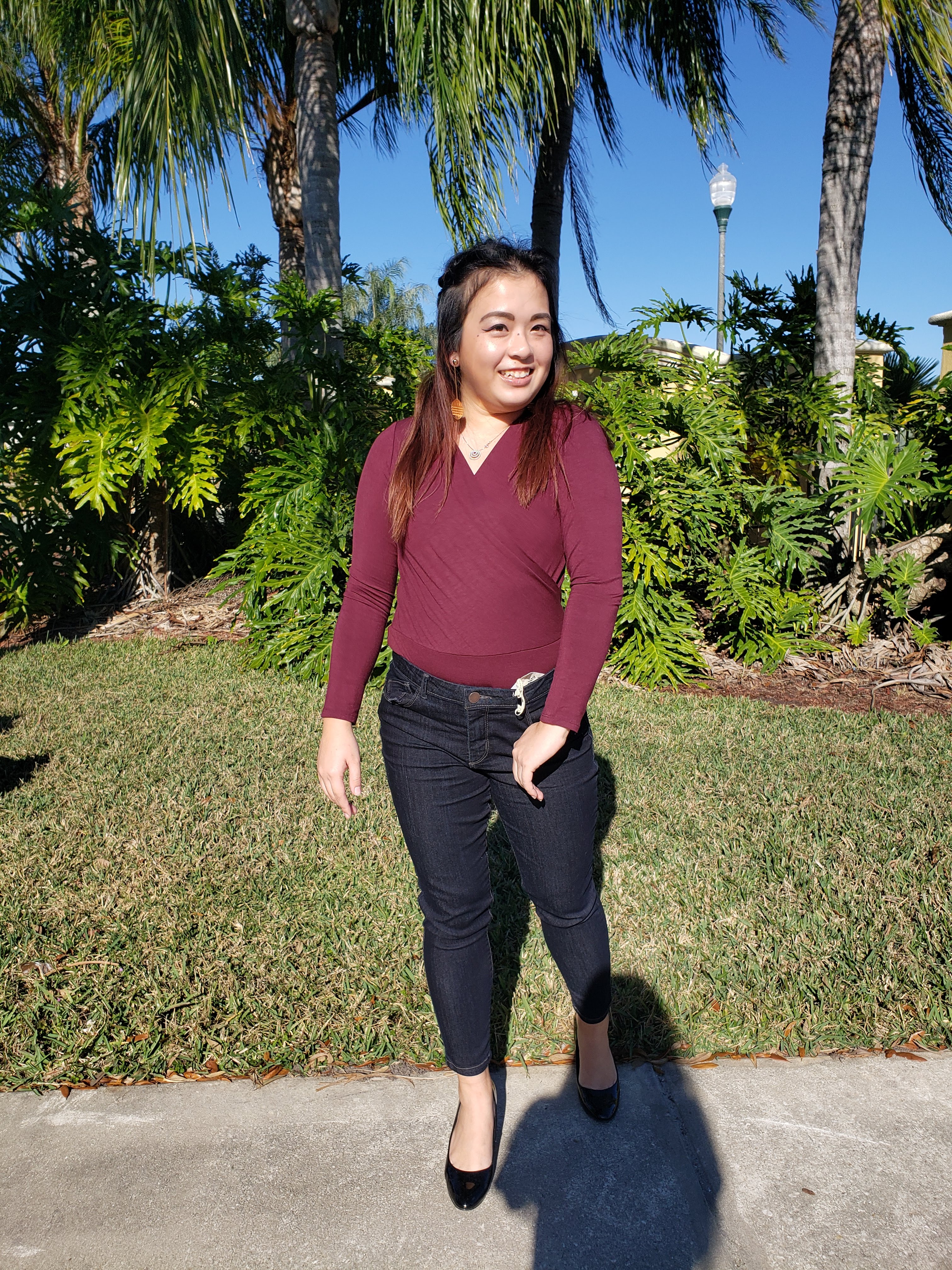 Looking at this photo, I like the look of this red top on me. But look at how cute the jeans are! And they're always so comfortable.