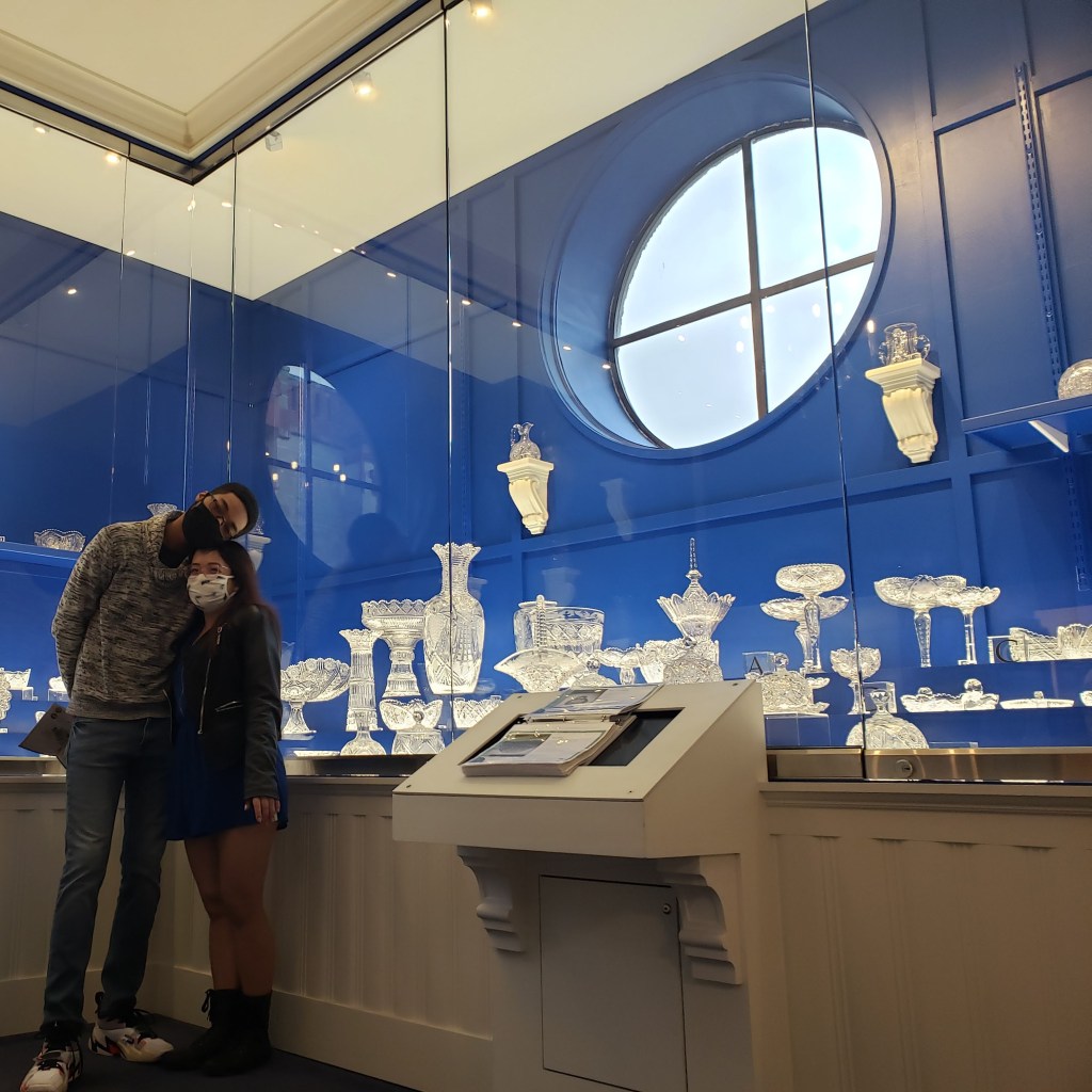 I believe this photo was taken in an exhibit where they were showcasing the transformation of glassware. But I loved how I seemed to match the room and how cute we look.