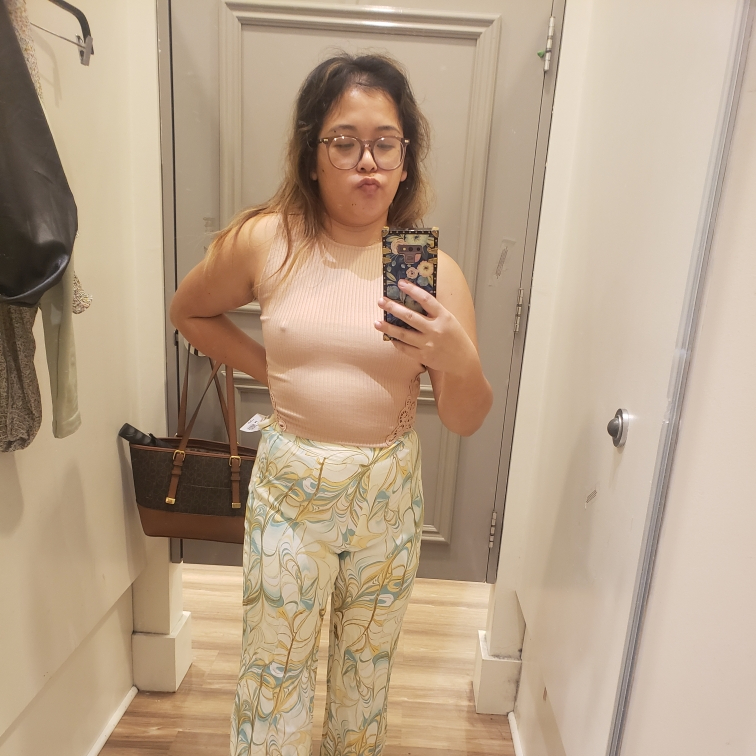 So as you can see, I decided to go shopping without a bra on this particular day, which also might have played a role in my shopping struggles. But this nude tank was also an option I was grappling with, and I decided against it because it was kind of tame, and also so perfectly matched my skin tone that it might have been as if I wasn't wearing a shirt.