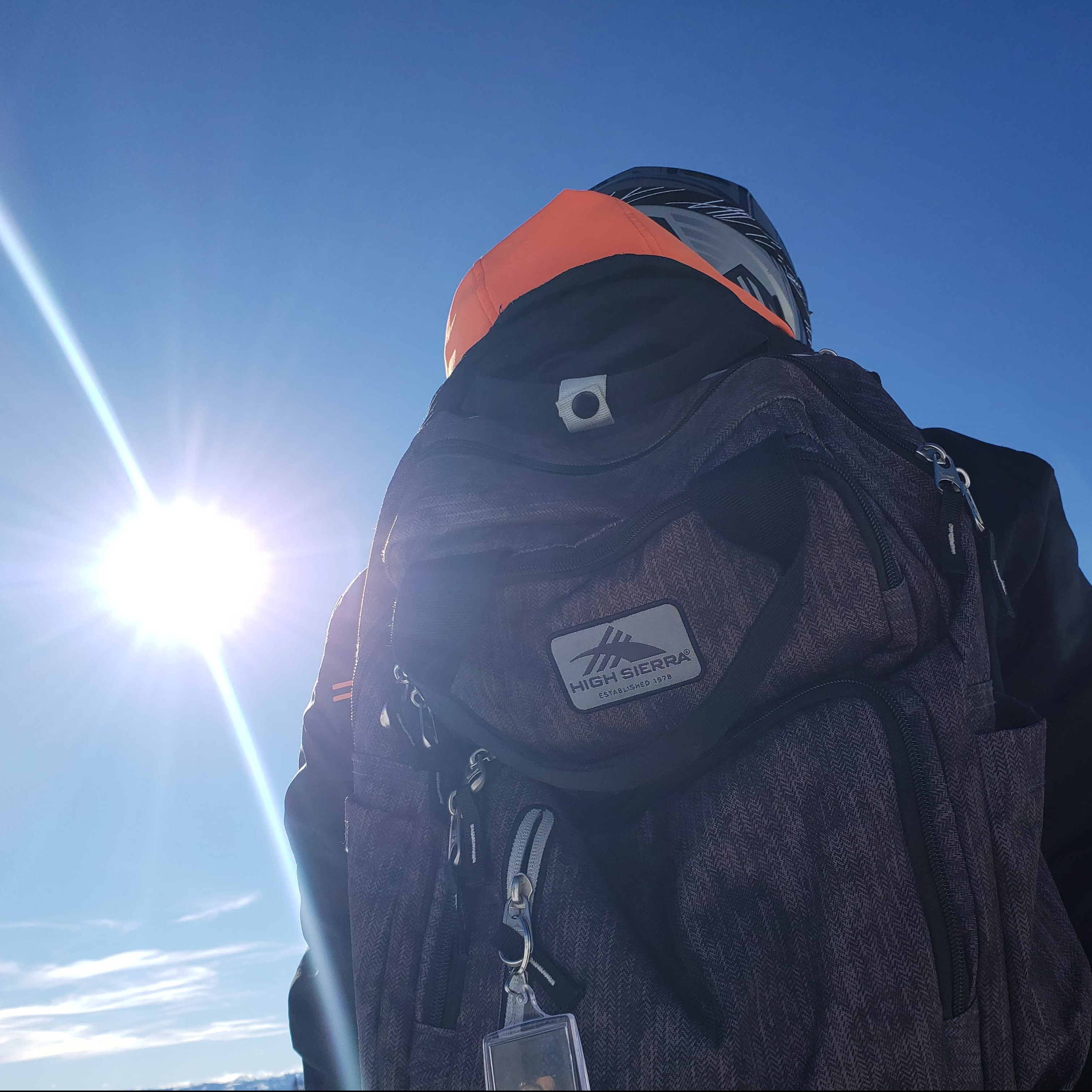 I got this backpack as a gift at the Her Campus Conference I went to, and then I gifted it to my boyfriend. In this photo, I was riding with him on a snowmobile. This was a very comfortable backpack, with lots of organizational pockets.