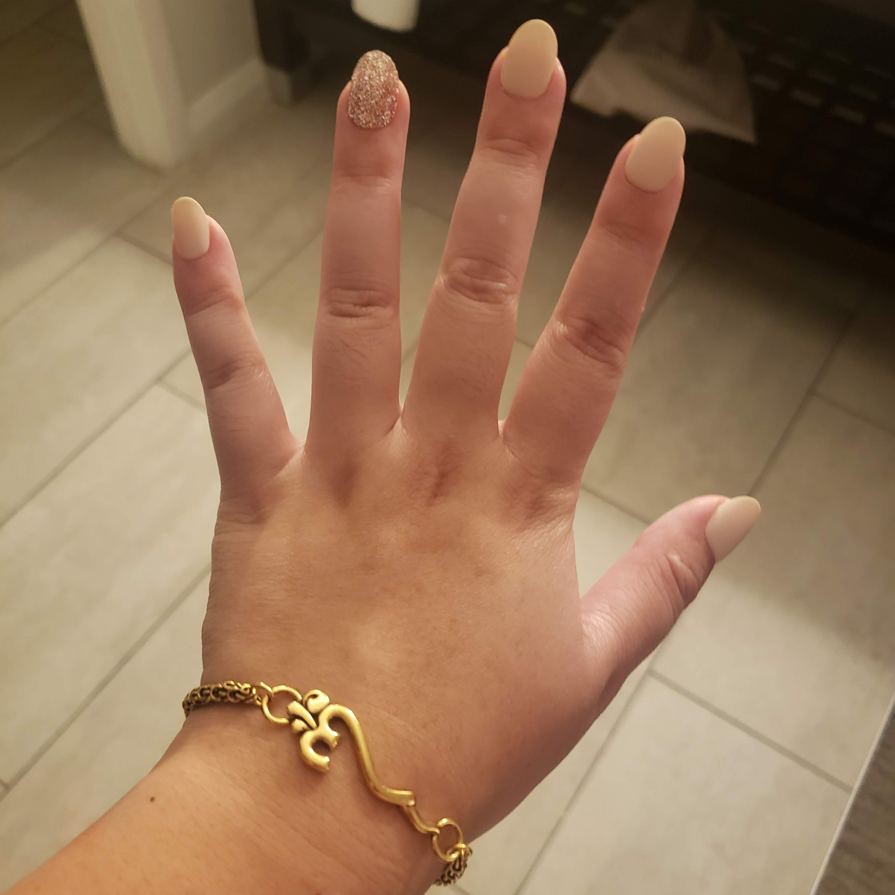 So Asanti's mom has matching bracelets with each of her children, and she brought me one this time so that we could match. The gold bracelet is an Alex and Ani Connections bracelet, so that we will always be connected.