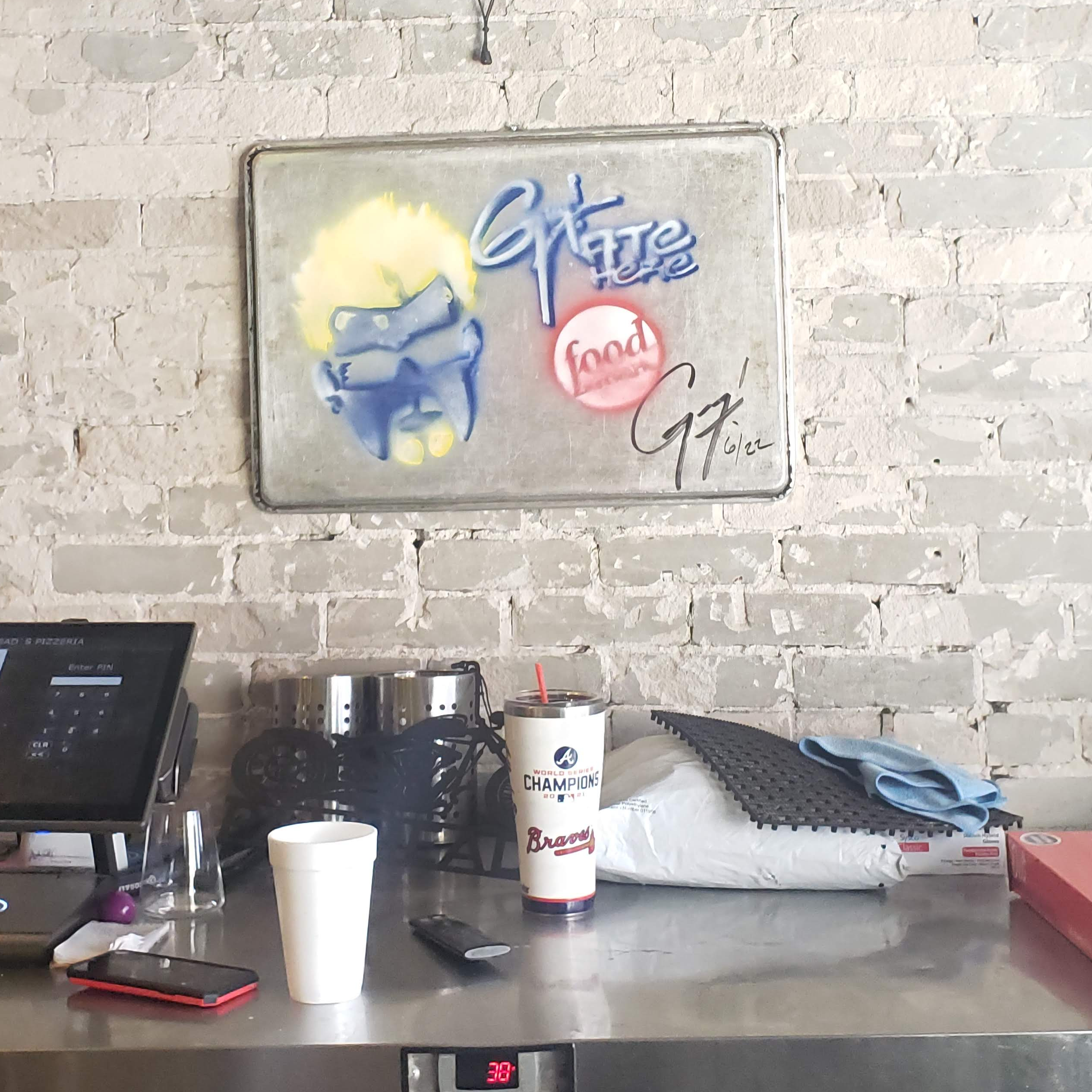 There was a bit of a wait when I came into Panheads to pick up my takeout order, and I saw this sign while I sat and waited. It looks like he spray painted a baking pan and signed it for them to commemorate, which I thought was cool.