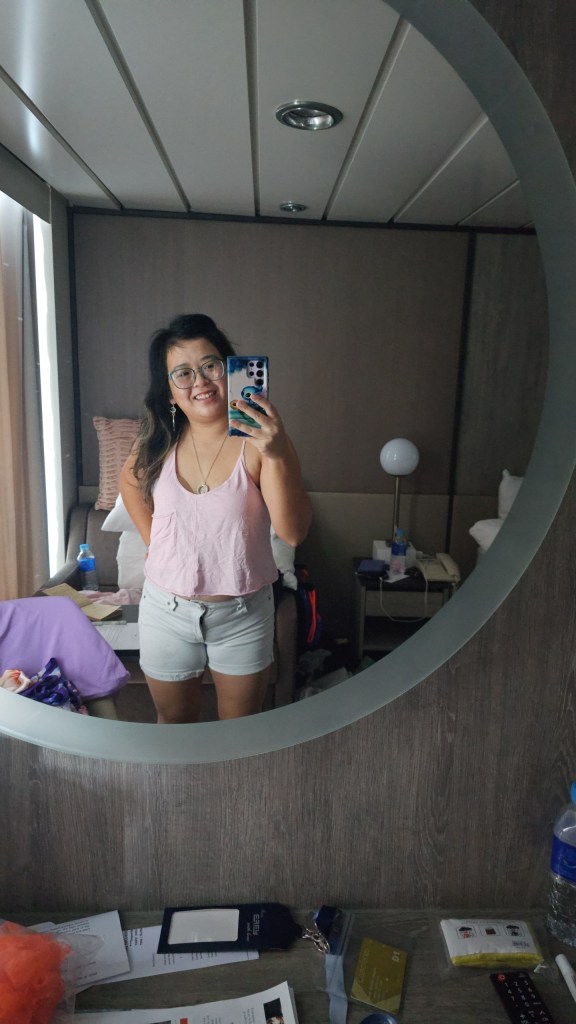 I had never been on a cruise before, so I took this mirror selfie in the cabin of my first ever cruise. Which went around Asia, so I feel like it would be very hard to beat that.