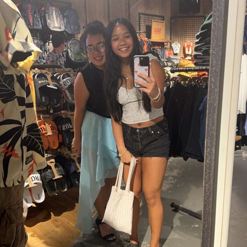 A selfie of Kimmy and I in a Superdry mirror. 