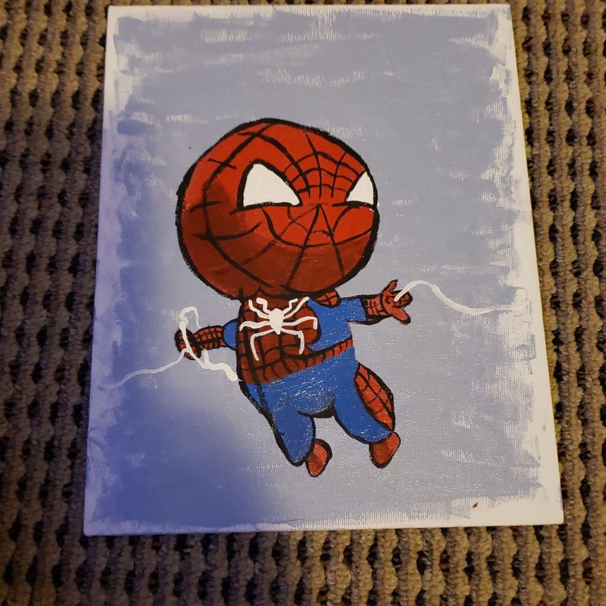 A Spiderman painted on canvas with acrylic paint that I had done by hand on a girls night.