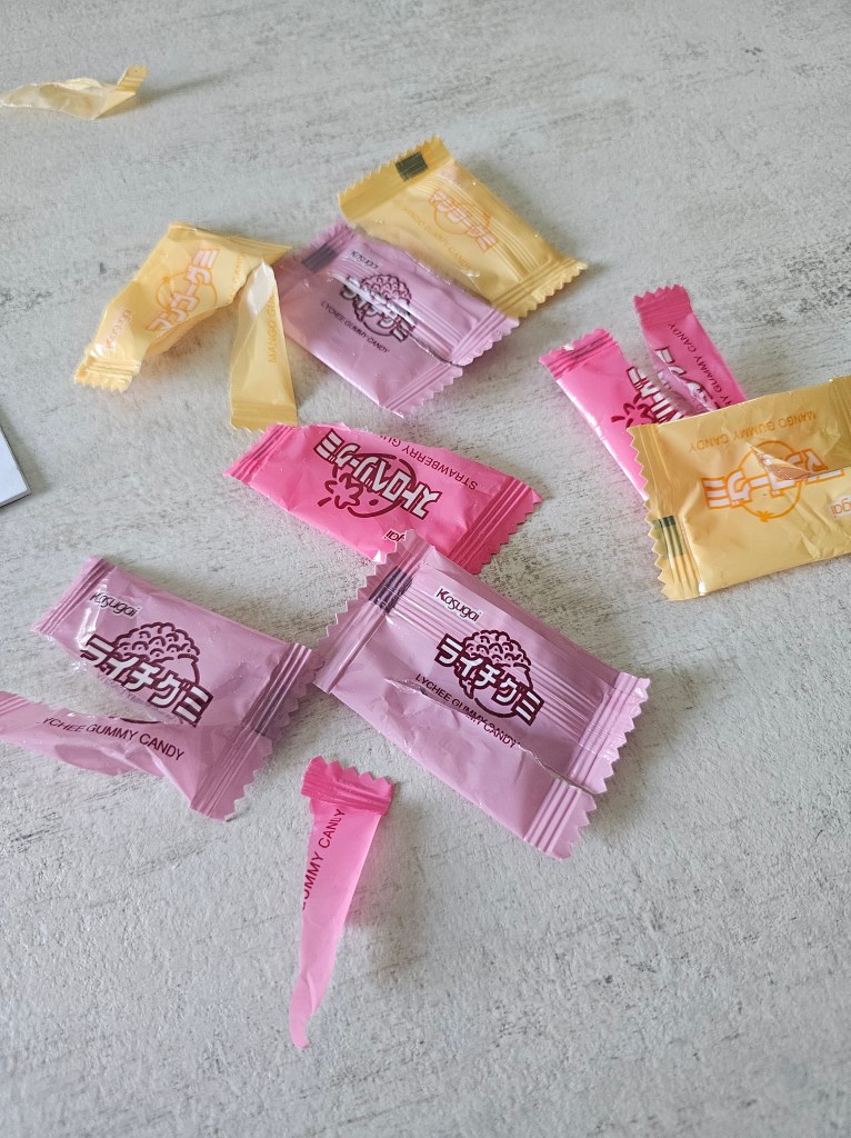 Some empty candy wrappers from the Katsugi company.